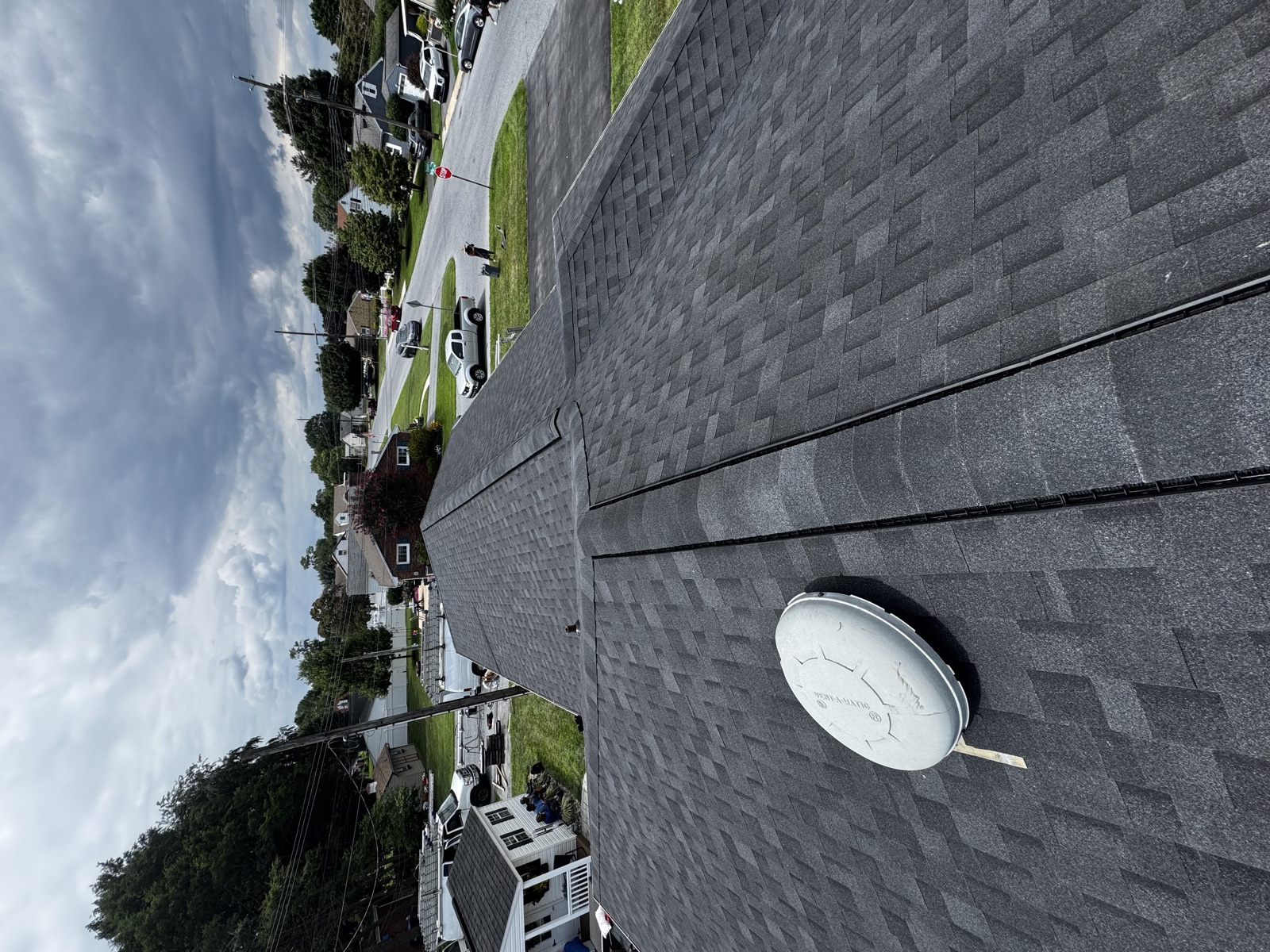 Fresh architectural shingle install, view from the ridge