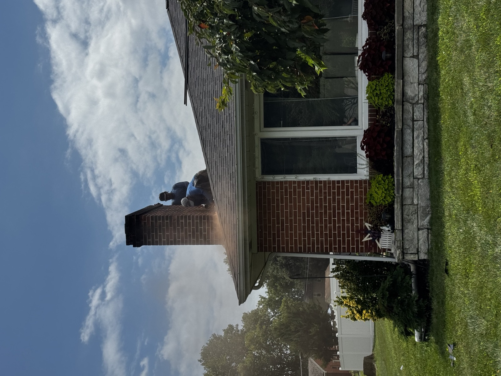 Detail work at the chimney line